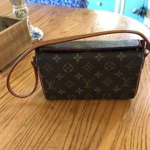 Authentic Louis Vuitton shoulder clutch bag.